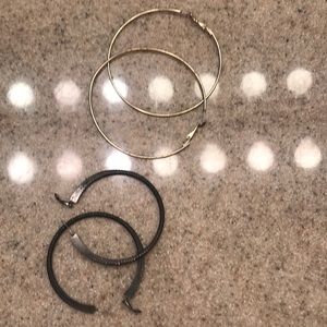 Large silver hoops and larger gold hoops